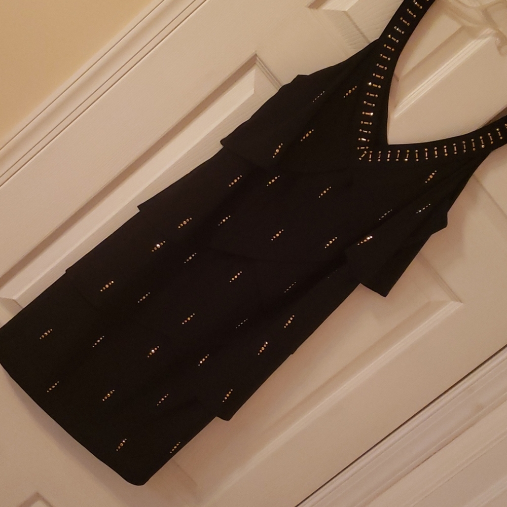 Black dress with gold embellishments